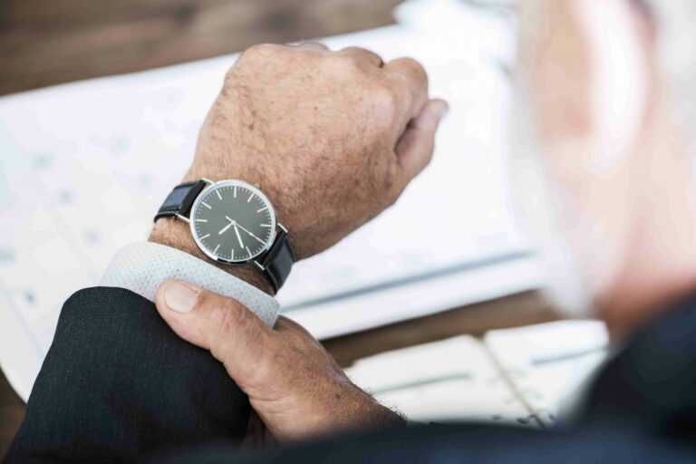 businessman looking at time